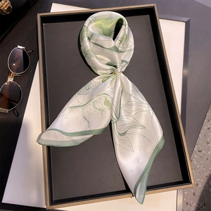Fresh green floral print 100% mulberry silk scarf with pearl buckle on elegant tray