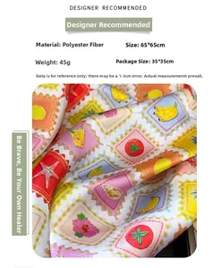 Close-up of a 65x65cm silk-feel polyester scarf with a colorful stamp fruit print