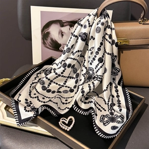 Floral print silk square scarf in black and white with heart pearl brooch