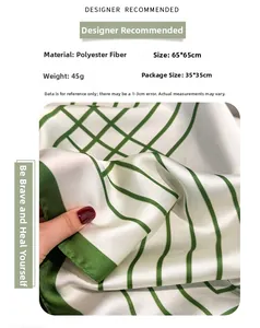Detail of 65x65cm polyester silk scarf showing luxury geometric stripes and satin texture