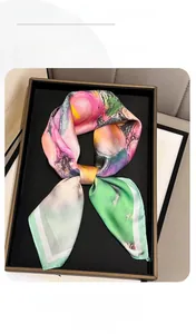 Detail of silk-like scarf with abstract oil painting floral print and smooth texture