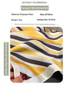 Detailed view of yellow and grey geometric stripe patterns on 65x65cm silk scarf