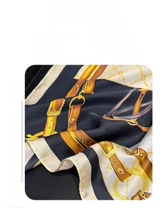 Detailed view of luxury chain print scarf made of satin polyester fabric 65x65cm