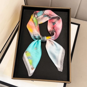Artistic oil painting style floral silk scarf in elegant bow tie knot display