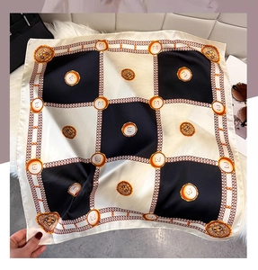 Classic black and white checkered silk scarf with gold chain and lion head patterns