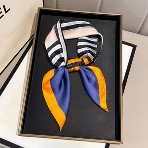 Silk-like square scarf with orange and blue geometric stripe print in a gift tray