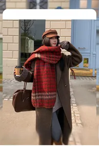 Winter plaid scarf in red and brown check pattern with heavy fleece wool-like texture