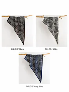 Detailed texture of printed silk scarves in cocoa brown, white and navy blue colors