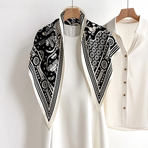 Stylish black and white printed neck scarf with classic European architectural patterns