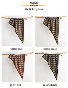 Detailed grid of vintage geometric print silk scarves in blue, green, red, and black