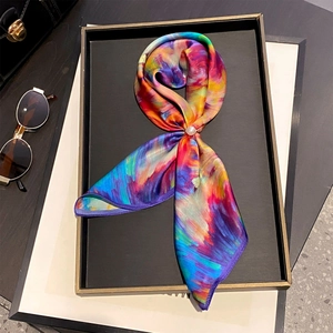 Silk scarf with abstract oil painting print and pearl buckle in a luxury tray