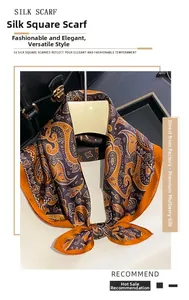 Detailed close-up of premium paisley pattern mulberry silk square scarf with glossy texture