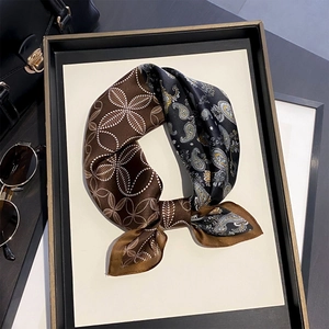 Elegant 100% silk square scarf with paisley pattern and polka dots on a stylish backdrop