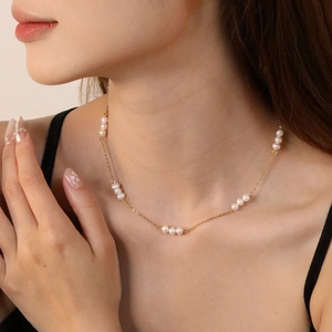Elegant 18K gold plated stainless steel chain necklace with groups of freshwater pearls