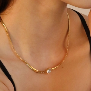 Elegant 18K gold plated necklace with a round clear gemstone pendant on a fine chain