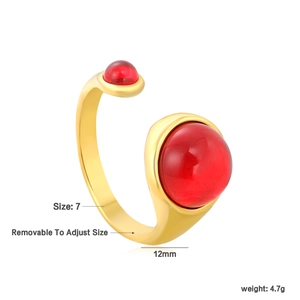 Detail view of gold open ring with red cabochons showing size 7 and 12mm width specs