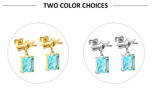 Detail showing gold and silver twisted stud earrings with light blue rectangle zircons