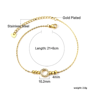 Esquema detallado de tobillera de acero inoxidable dorado con colgante de circonita