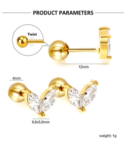 Detail of 18K gold-plated stainless steel leaf stud earrings with marquise crystals