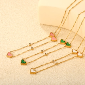 Chic heart pendant necklaces with cat-eye stones and crystal accents in gold finish