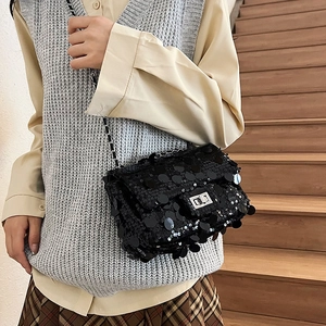 Stylish black sequin flap crossbody bag with silver metal lock and chain strap for women