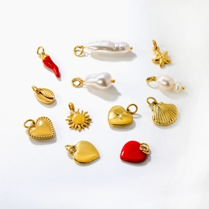 Collection of stainless steel pendants featuring chili, pearls, starfish, and gold hearts