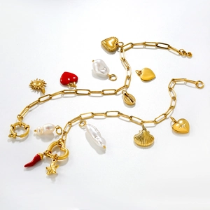 18K gold plated stainless steel charm necklace with baroque pearls and heart pendants