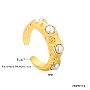 Detail view of gold textured ring with four white pearls and size 7 specifications