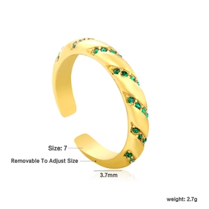 Detail view of gold twisted ring featuring green zircon stones and adjustable size specs