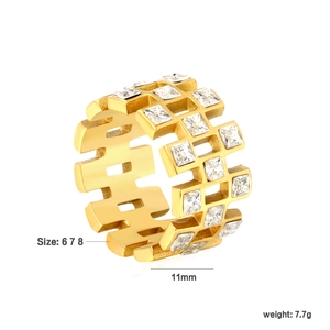 Macro view of 11mm wide 18k gold plated stainless steel ring with checkered zircon design
