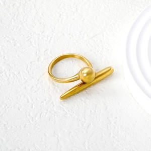 Minimalist geometric 18K gold stainless steel ring with ball and bar design on white background