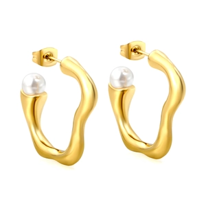 French irregular wave gold C-shape earrings with elegant white pearl accents