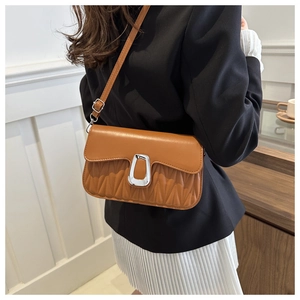 Brown leather crossbody bag with V-shaped pleated texture and elegant metal buckle