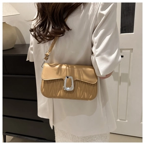 Khaki pleated PU leather shoulder bag with a silver geometric buckle shown from the back