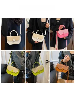 Model display of stylish contrast color crossbody box bags in four vibrant color options