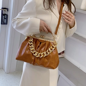 Retro caramel pleated doctors bag with gold chain strap and metal clasp closure