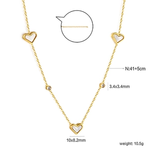 Macro detail of 18k gold plated heart necklace with white shell inlay and measurements
