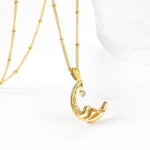 Collier en acier inoxydable plaqué or 18 carats avec pendentif lune et cristal zircon