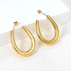 Minimalist gold U-shaped thick hoop earrings with polished stainless steel finish