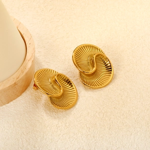 French vintage wavy gold stud earrings with elegant spiral geometric texture
