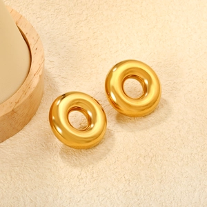 Minimalist chunky golden donut hoop earrings with high-polish mirror finish for women