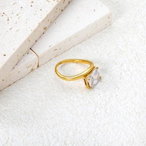 Elegant 18K gold plated ring with princess cut clear zircon in a classic 4-prong setting