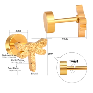 Detail of gold-plated dragonfly stud earring with cubic zirconia and screw-back closure