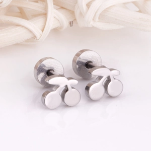 Macro shot of silver polished stainless steel cherry-shaped stud earrings in a pair