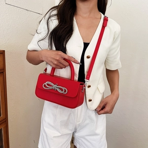 Red structured bow handbag with silver rhinestones and detachable shoulder strap for women