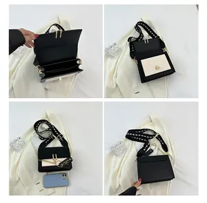 Detail view of contrast color crossbody bag with woven strap and interior compartments