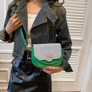 Green leather box bag with blue striped flap and silver buckle for women
