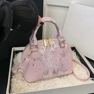 Pink snakeskin patterned shell handbag with metallic silver panel and crossbody strap