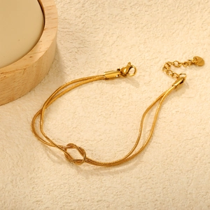 Double-layered 18K gold plated stainless steel snake chain bracelet with knot detail