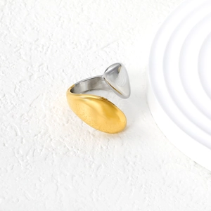 Two-tone 18k gold and silver geometric open ring with irregular pebble texture